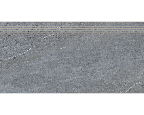 Sivá schodisková dlaždica so štruktúrou a hranou schodu