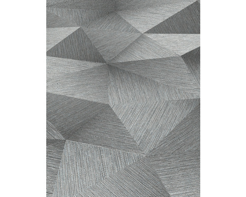 Detail šedej tapety s trojrozmerným geometrickým vzorom.