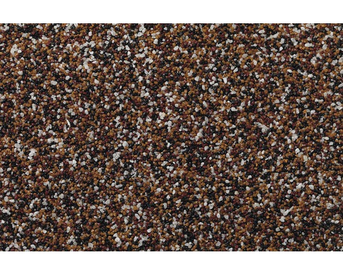 Detailný pohľad na štruktúru fasádnej omietky s malými, nepravidelnými kamienkami