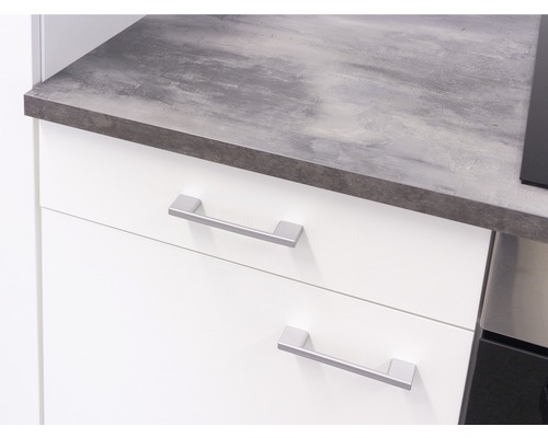 Kuchynská spodná skrinka so sivou pracovnou doskou a zásuvkami