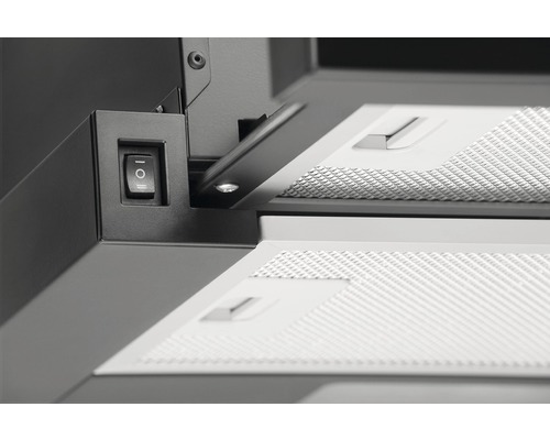 Detail digestora s vypínačom a tukovými filtrami.