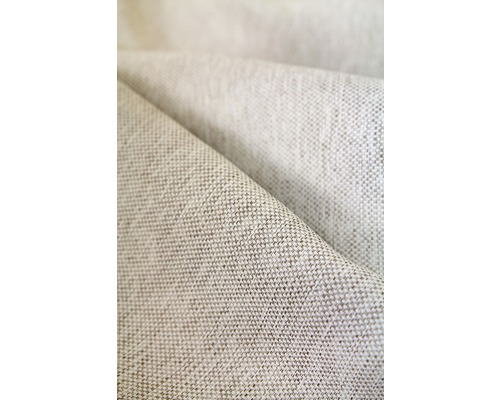 Detail béžovej látky s tkanou štruktúrou