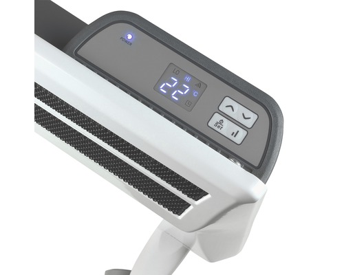 Detailný záber vykurovacieho zariadenia s digitálnym ukazovateľom teploty a ovládacím panelom.