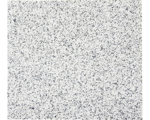 Detailný záber žulovej dosky so škvrnitou textúrou.