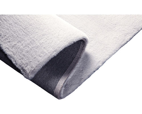 Detail svetlého koberca s vlasom