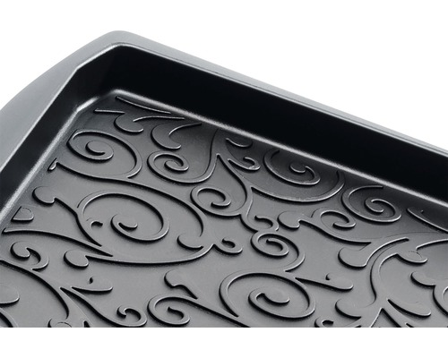 Odkvapkávač na topánky s ozdobným vzorom