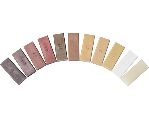 Sada tyčiniek dreveného tmelu s písmenovými značkami na výber farieb.