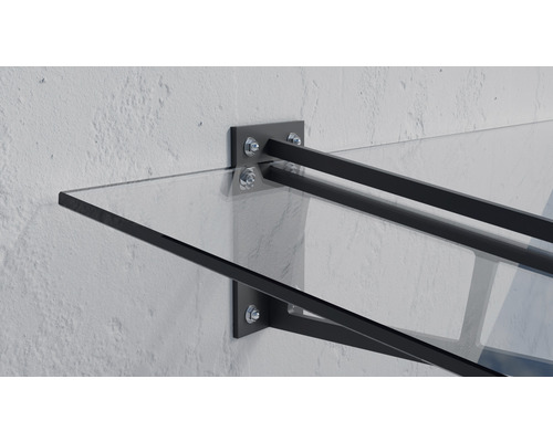 Sklenený prístrešok s kovovou konzolou na stene