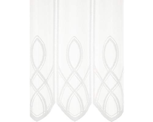 Detail bielej okenné záclony s ozdobným vzorom