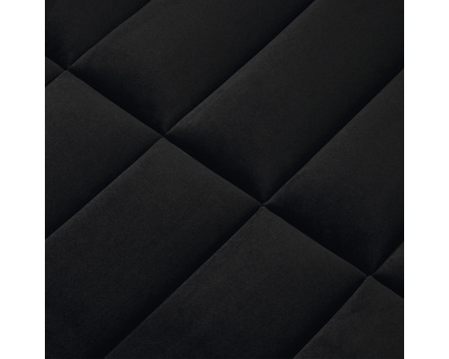 Detailný záber prešívanej látky s kosoštvorcovým vzorom