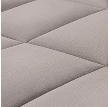 Detail prešívaného textilného povrchu