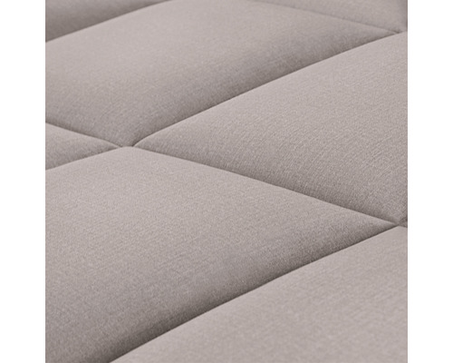 Detail prešívaného textilného povrchu