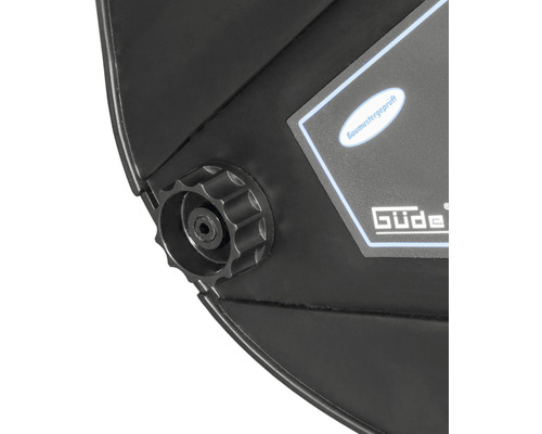 Detailný pohľad na zváračskú masku s nastavovacím gombíkom a logom Güde