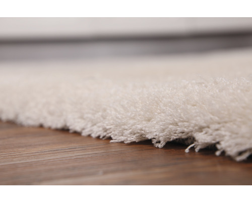 Detailný záber koberca s vysokým vlasom