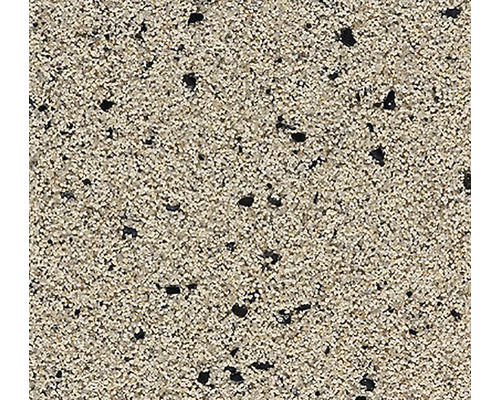 Detail povrchu s jemnou, zrnitou textúrou a roztrúsenými tmavými časticami.