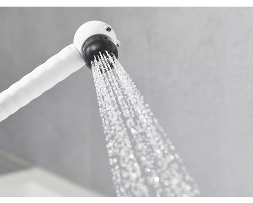 Sprchová hlavica s tečúcou vodou