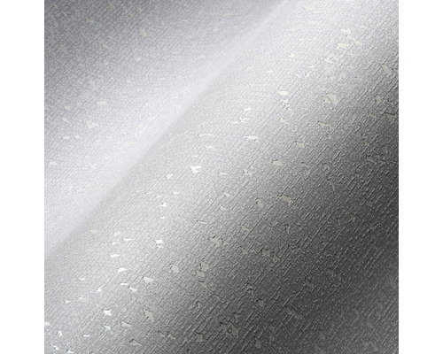 Detail šedej tapety s nepravidelnou štruktúrou