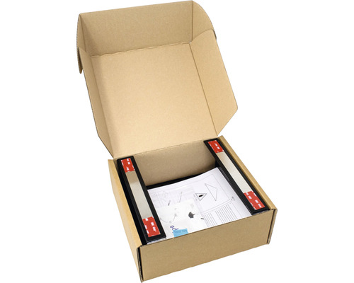 Otvorená kartónová krabica s čiernymi profilmi a montážnym návodom