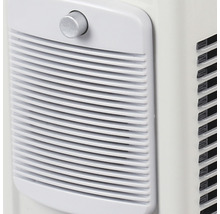 Detail klimatizačnej jednotky s ventilačnou mriežkou a otočným gombíkom