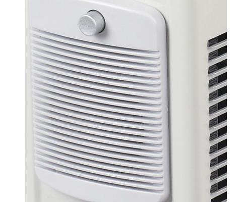 Detail klimatizačnej jednotky s ventilačnou mriežkou a otočným gombíkom