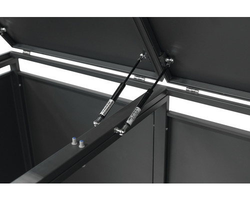 Detail otvoreného úložného boxu s plynovými vzperami