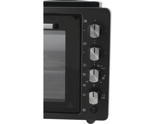 Detailný záber mini rúry s otočnými ovládačmi