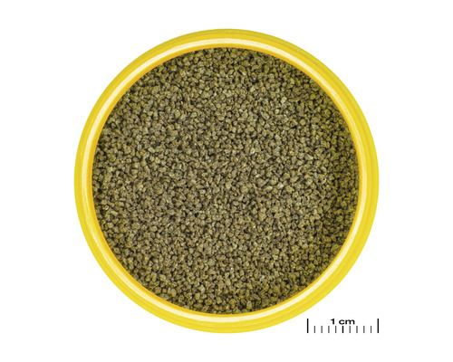 Granulované krmivo pre ryby v žltej nádobe