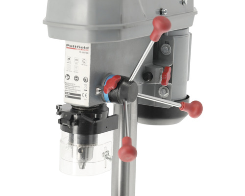 Detailný záber stĺpovej vŕtačky s upínacími pákami