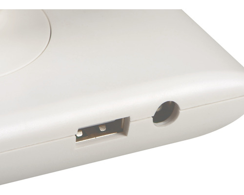 Detail bieleho povrchu s USB a audio portom