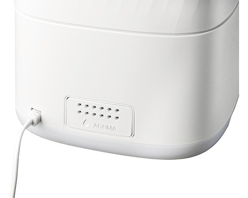 Aróma difuzér, detailný pohľad na vetrací otvor a napájací konektor.