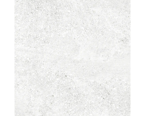 Detailný záber svetlej podlahovej dlaždice so škvrnitým povrchom