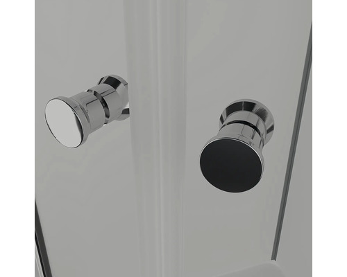 Detailný záber dvoch gombíkov dverí na sprchovacom kúte