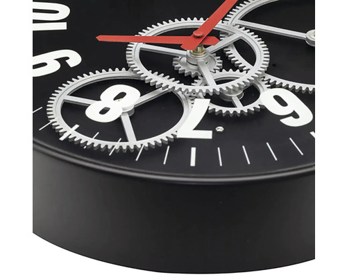 Nástenné hodiny s viditeľným mechanizmom a ozubenými kolesami