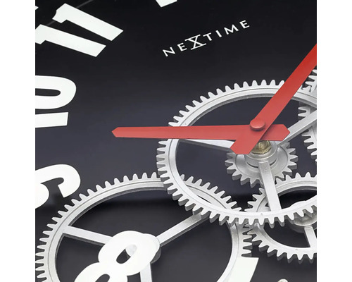 Detailný pohľad na nástenné hodiny Nextime s viditeľným hodinovým strojčekom