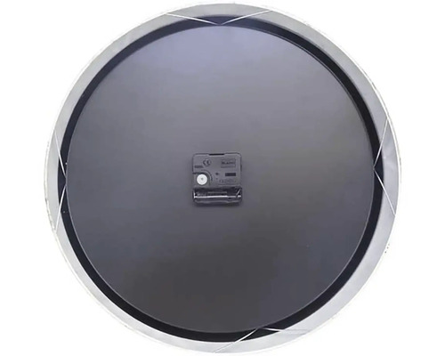 Zadná strana nástenných hodín so strojčekom