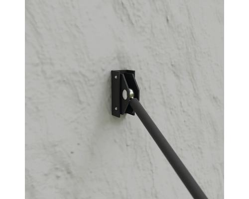 Nástenný držiak s tyčou na upevnenie