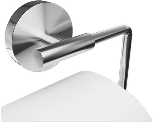 Kovový držiak toaletného papiera na montáž na stenu s rolkou toaletného papiera.