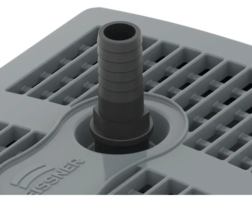 Pohľad zhora na plastovú odtokovú mriežku s hadicovou prípojkou