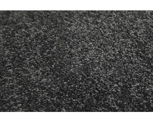 Detailný záber sivého koberca