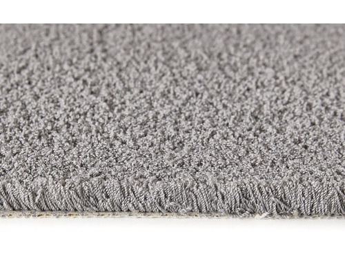 Detail šedého koberca