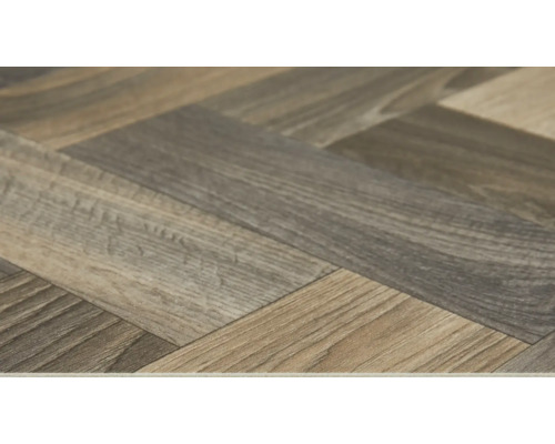 Detail laminátovej podlahy so vzorom rybej kosti