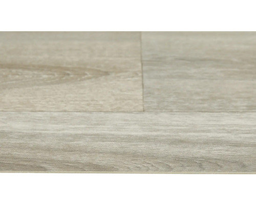 Detail laminátovej podlahy s dreveným vzhľadom