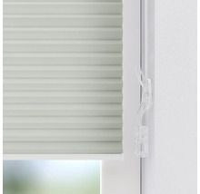 Detailný záber plisovanej žalúzie s ovládacím prvkom na dekoráciu okna