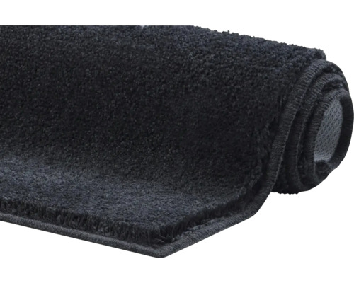 Zrolovaná kúpeľňová rohož