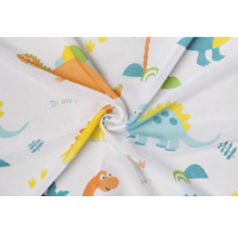Látka so vzorom dinosaurov