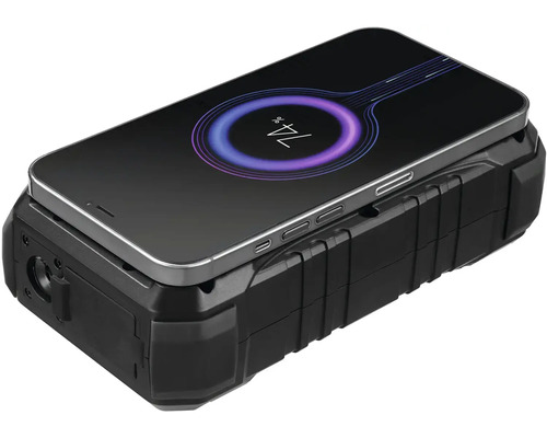 Čierny akumulátorový stavebný reflektor s nabíjacím sa mobilným telefónom