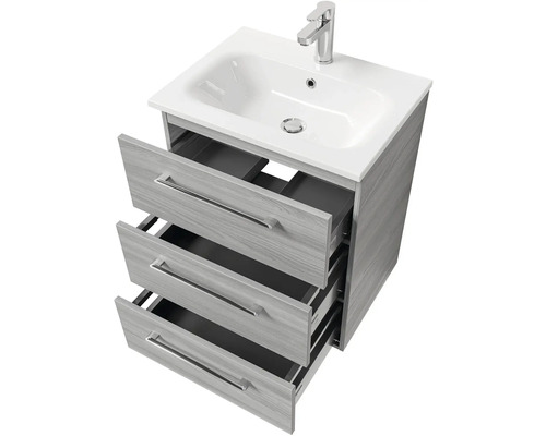 Skrinka pod umývadlo s tromi otvorenými zásuvkami a batériou