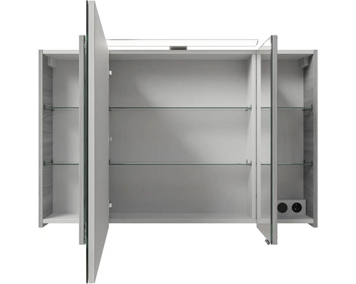 Otvorená zrkadlová skrinka so sklenenými policami a zásuvkami