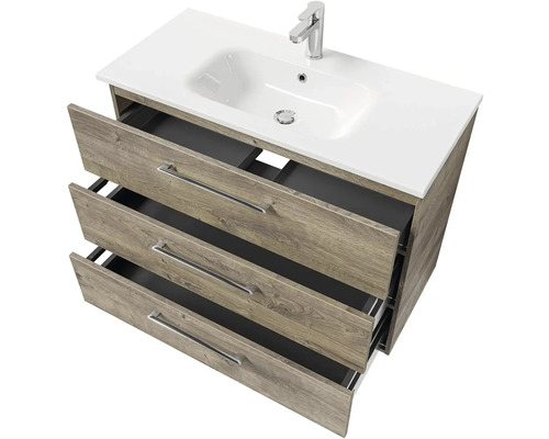 Skrinka pod umývadlo s tromi otvorenými zásuvkami, umývadlom a batériou