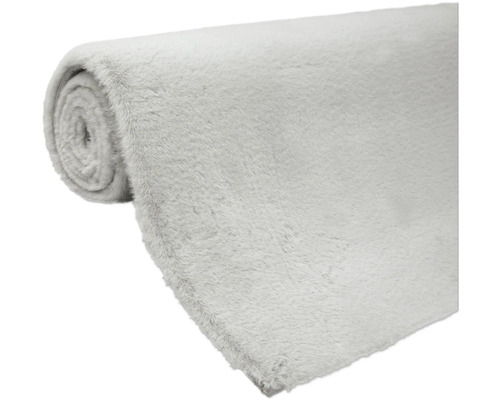 Zrolovaný, mäkký koberec